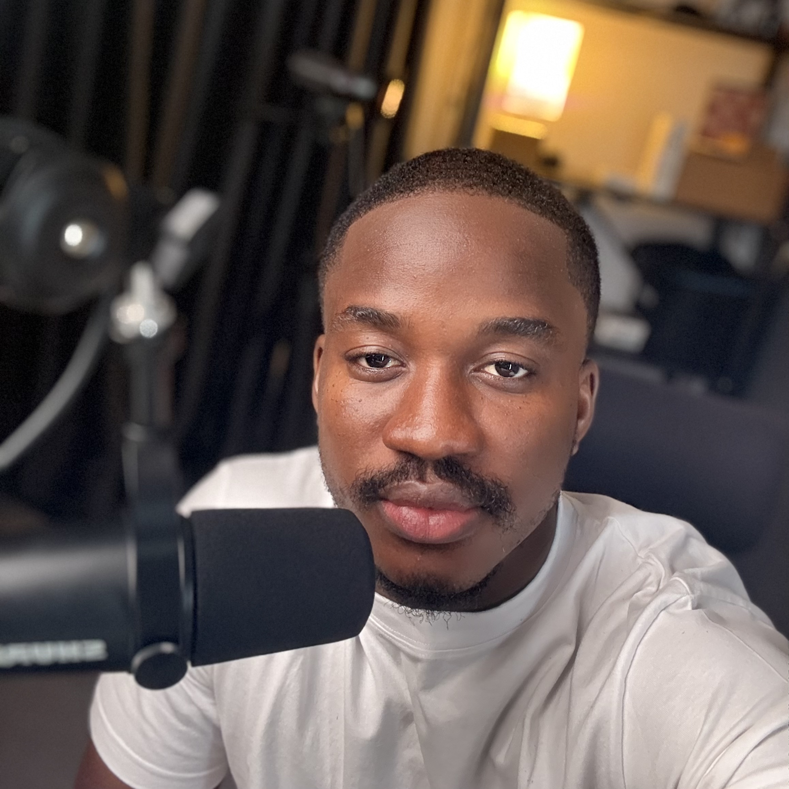 Nonso Umeh recording content in his studio
